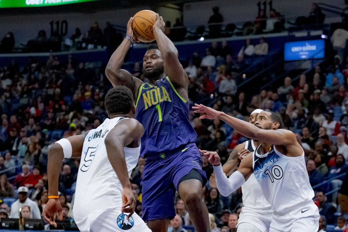 Jan 7, 2025; New Orleans, Louisiana, USA; New Orleans Pelicans forward Zion Williamson (1) passes against Minnesota Timberwolves guard Anthony Edwards (5) and Minnesota Timberwolves guard Mike Conley (10) during the first half at Smoothie King Center. Mandatory Credit: Matthew Hinton-Imagn Images