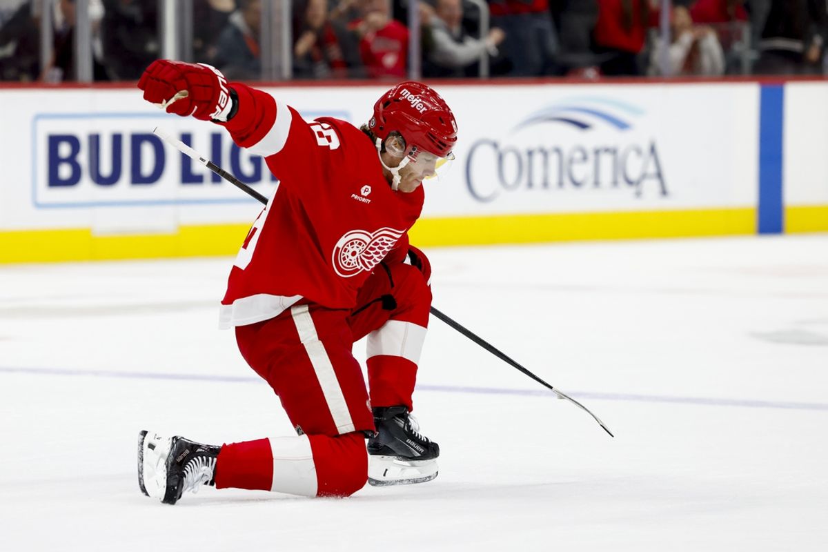Jan 7, 2025; Detroit, Michigan, USA; Detroit Red Wings right wing Patrick Kane (88) celebrates after scoring in overtime against the Ottawa Senators at Little Caesars Arena. Mandatory Credit: Rick Osentoski-Imagn Images