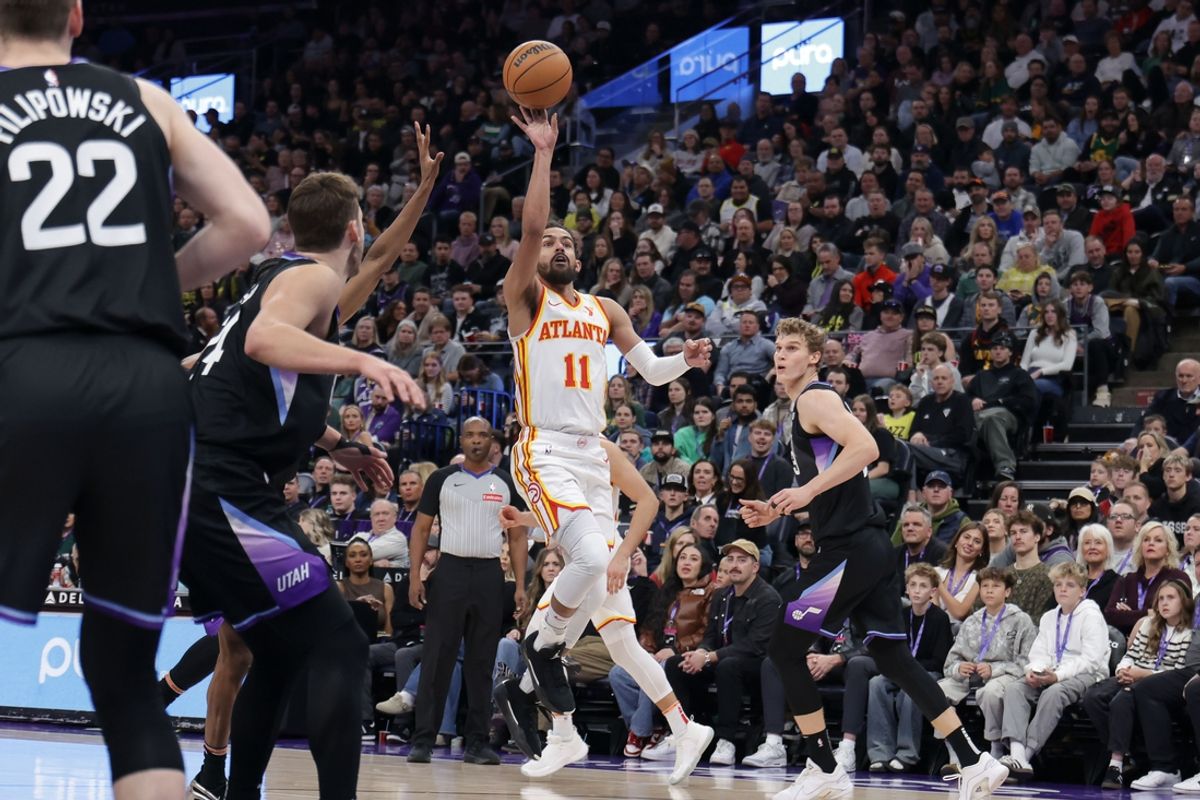 Jan 7, 2025; Salt Lake City, Utah, USA;  Atlanta Hawks guard Trae Young (11) shoots the ball during the second quarter against the Utah Jazz at Delta Center. Mandatory Credit: Chris Nicoll-Imagn Images