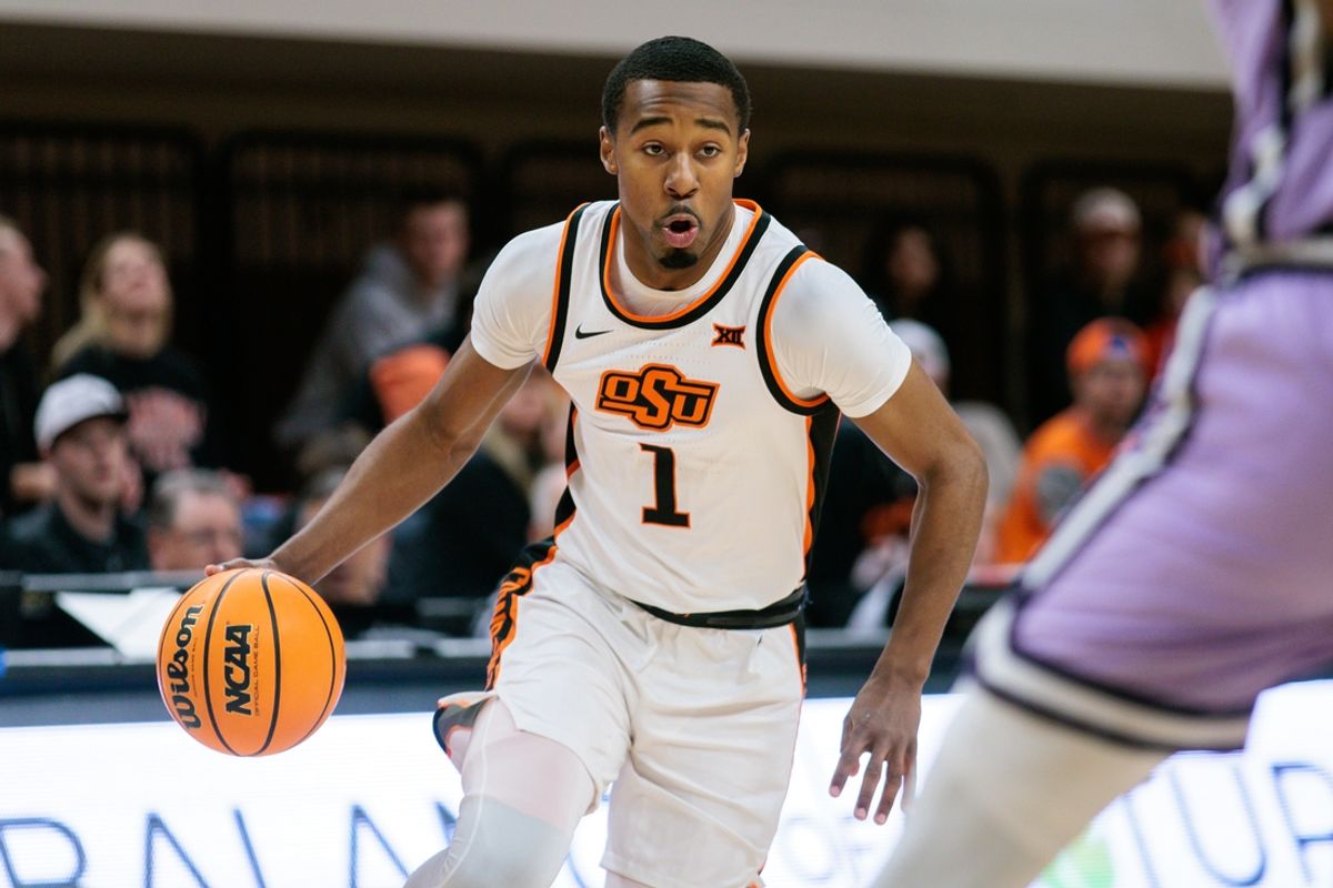 Jan 7, 2025; Stillwater, Oklahoma, USA; Oklahoma State Cowboys guard Bryce Thompson (1) brings the ball up court during the first half against the Kansas State Wildcats at Gallagher-Iba Arena. Mandatory Credit: William Purnell-Imagn Images