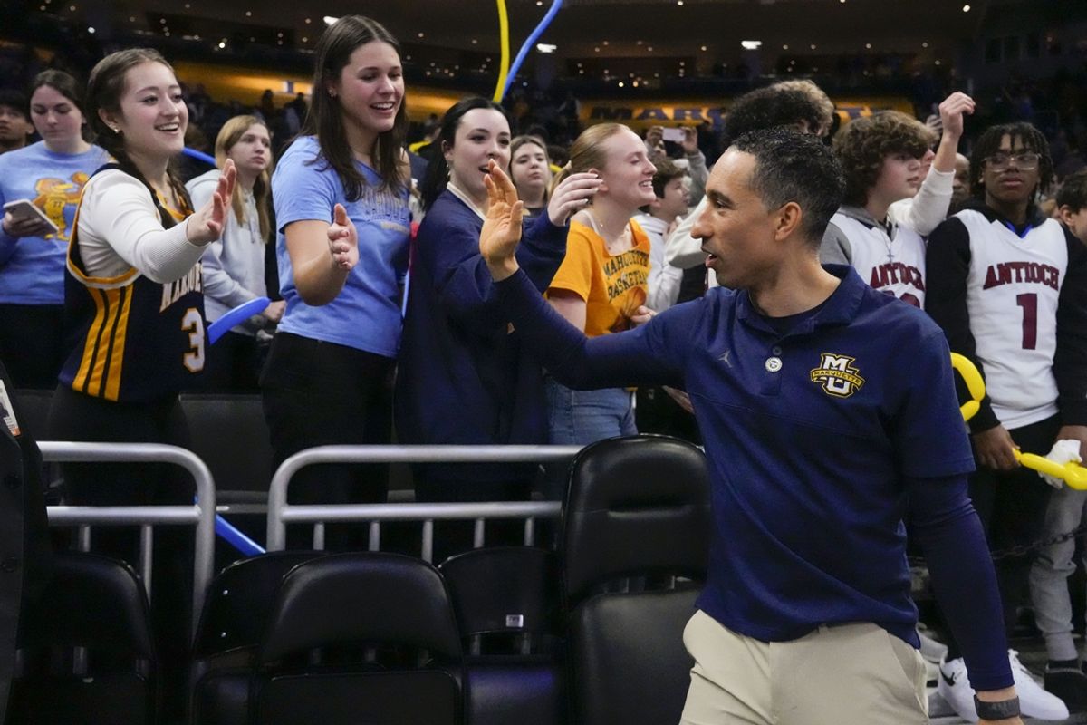 Jan 7, 2025; Milwaukee, Wisconsin, USA;  Marquette Golden Eagles head coach Shaka Smart greets fans following the game against the Georgetown Hoyas at Fiserv Forum. Mandatory Credit: Jeff Hanisch-Imagn Images