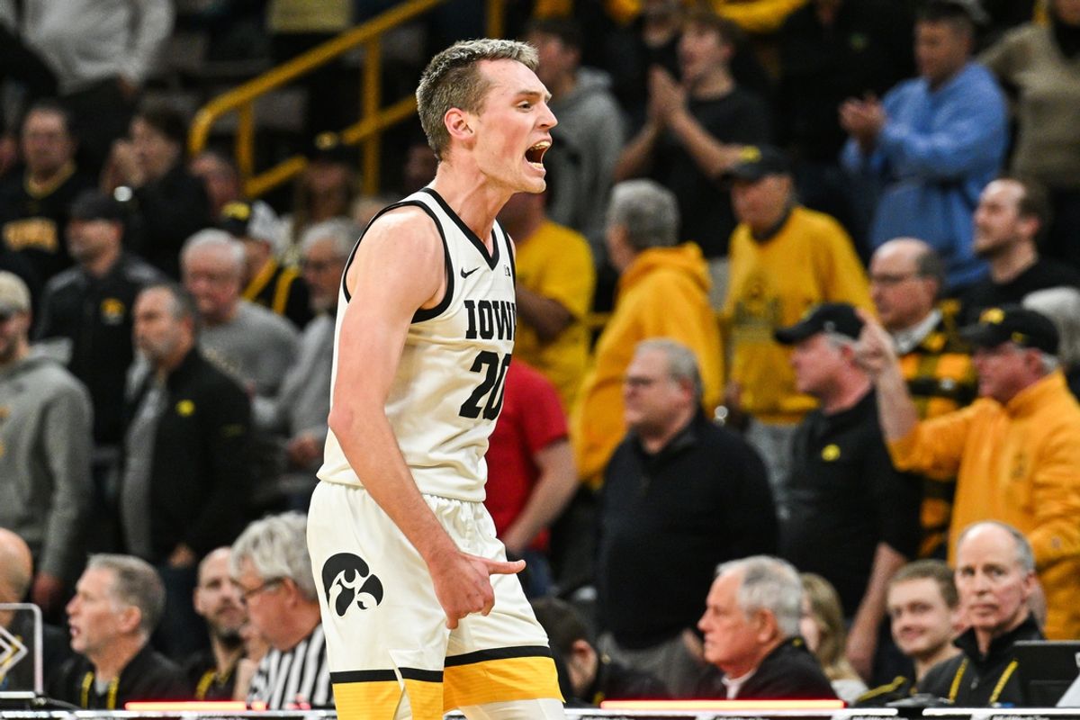 Jan 7, 2025; Iowa City, Iowa, USA; Iowa Hawkeyes forward Payton Sandfort (20) reacts against the Nebraska Cornhuskers during the second half at Carver-Hawkeye Arena. Mandatory Credit: Jeffrey Becker-Imagn Images