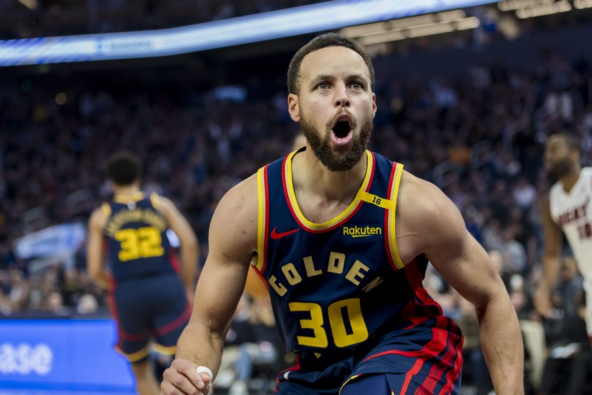 Jan 7, 2025; San Francisco, California, USA;  Golden State Warriors guard Stephen Curry (30) reacts after scoring against the Miami Heat during the fourth quarter at Chase Center. Mandatory Credit: John Hefti-Imagn Images