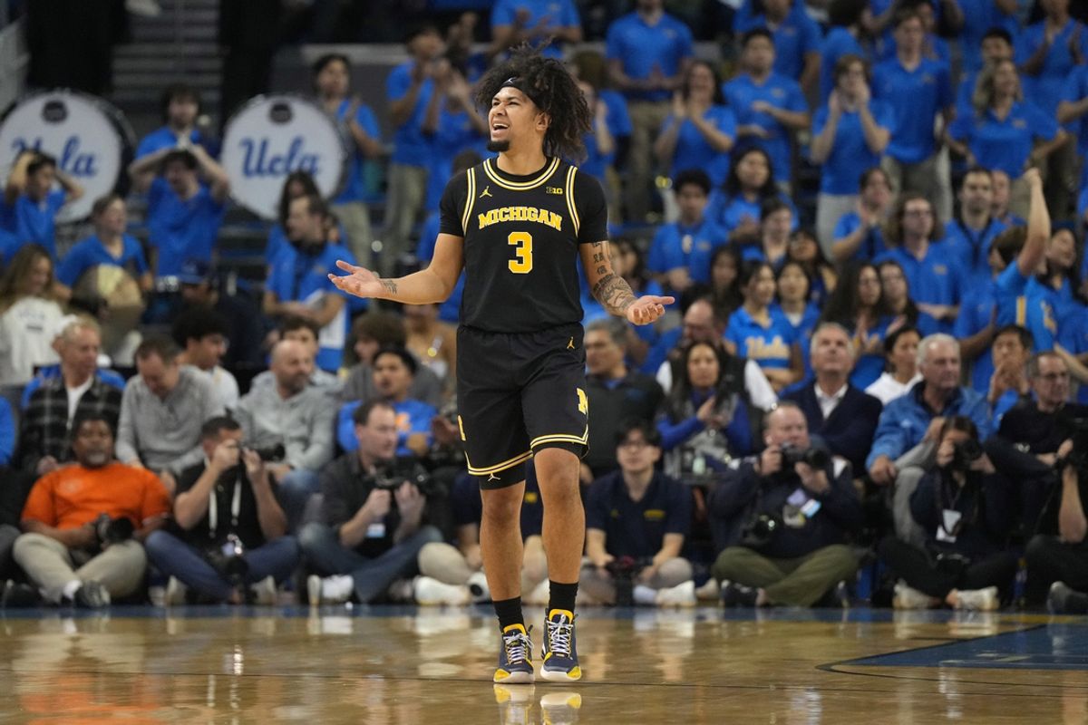 Jan 7, 2025; Los Angeles, California, USA; Michigan Wolverines guard Tre Donaldson (3) reacts against the UCLA Bruins in the second half at Pauley Pavilion presented by Wescom. Mandatory Credit: Kirby Lee-Imagn Images