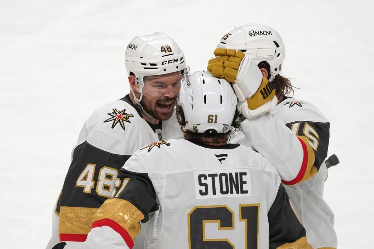 Jan 7, 2025; San Jose, California, USA; Vegas Golden Knights center Tomas Hertl (48) celebrates with right wing Mark Stone (61) and defenseman Noah Hanifin (15) after scoring a goal against the San Jose Sharks during the third period at SAP Center at San Jose. Mandatory Credit: Darren Yamashita-Imagn Images