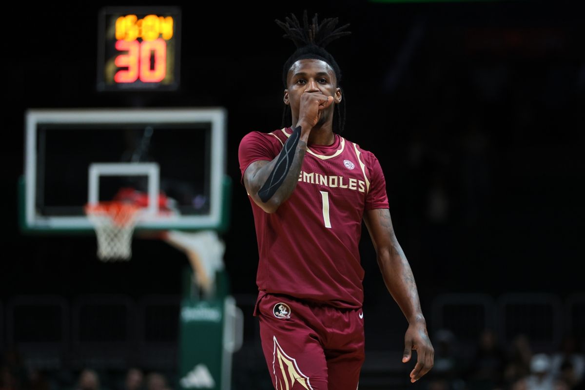 Jan 8, 2025; Coral Gables, Florida, USA; Florida State Seminoles guard Jamir Watkins (1) looks on against the Miami Hurricanes during the first half at Watsco Center. Mandatory Credit: Sam Navarro-Imagn Images