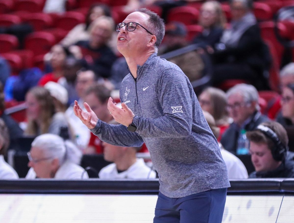 West Virginia head coach Mark Kellogg instructs his team during a Big 12 Conference women's basketball game against Texas Tech, Wednesday, Jan. 8, 2025, in United Supermarkets Arena.