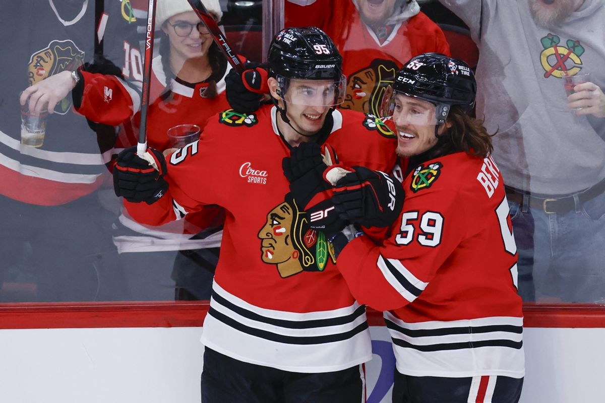 Jan 8, 2025; Chicago, Illinois, USA; Chicago Blackhawks right wing Ilya Mikheyev (95) celebrates with left wing Tyler Bertuzzi (59) after scoring against the Colorado Avalanche during the first period at United Center. Mandatory Credit: Kamil Krzaczynski-Imagn Images