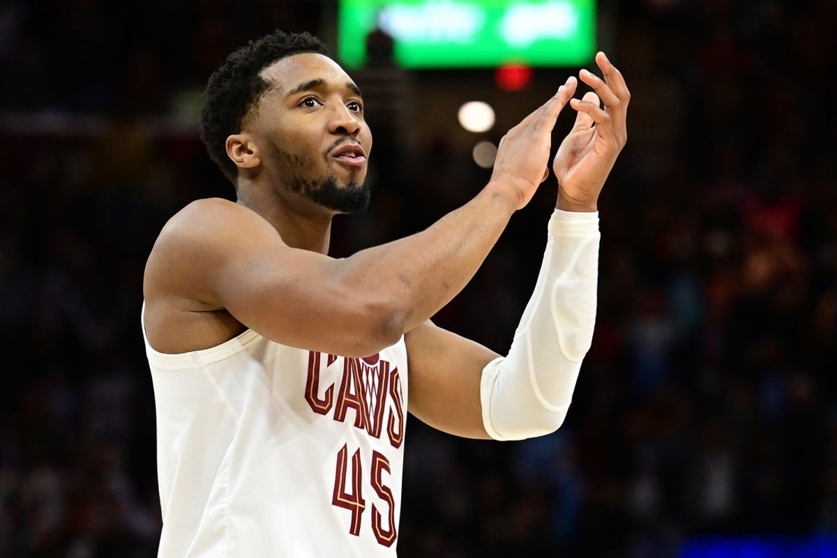 Jan 8, 2025; Cleveland, Ohio, USA; Cleveland Cavaliers guard Donovan Mitchell (45) celebrates during the second half against the Oklahoma City Thunder at Rocket Mortgage FieldHouse. Mandatory Credit: Ken Blaze-Imagn Images