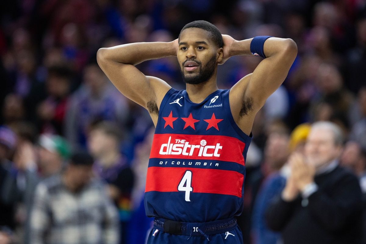 Jan 8, 2025; Philadelphia, Pennsylvania, USA; Washington Wizards guard Jared Butler (4) looks on after a Philadelphia 76ers score in the final minute of the fourth quarter at Wells Fargo Center. Mandatory Credit: Bill Streicher-Imagn Images