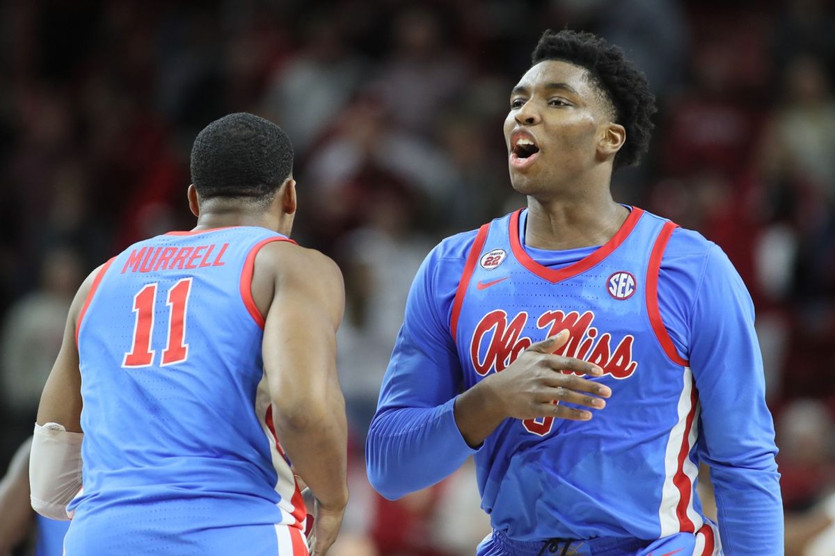 Jan 8, 2025; Fayetteville, Arkansas, USA; Ole Miss Rebels forward Malik Dia (0) celebrates after making a three point shot in the second half against the Arkansas Razorbacks at Bud Walton Arena. Ole Miss won 73-66. Mandatory Credit: Nelson Chenault-Imagn Images