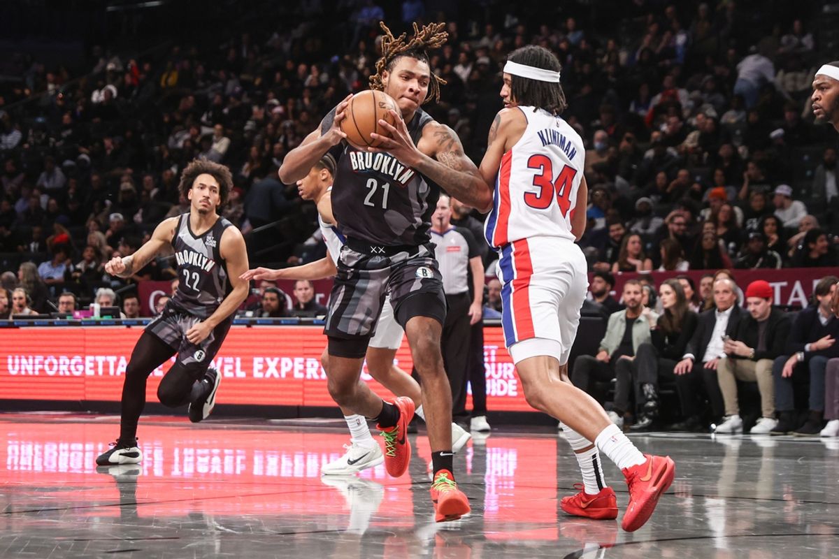 Jan 8, 2025; Brooklyn, New York, USA;  Brooklyn Nets forward Noah Clowney (21) looks to post up against Detroit Pistons forward Bobi Klintman (34) in the fourth quarter at Barclays Center. Mandatory Credit: Wendell Cruz-Imagn Images