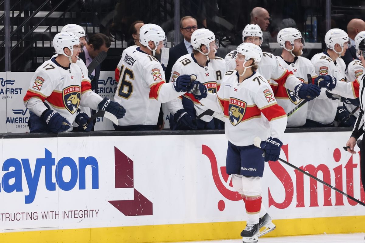 Jan 8, 2025; Salt Lake City, Utah, USA; Florida Panthers center Jesper Boqvist (70) celebrates with teammates an open net goal against the Utah Hockey Club during the third period at Delta Center. Mandatory Credit: Rob Gray-Imagn Images