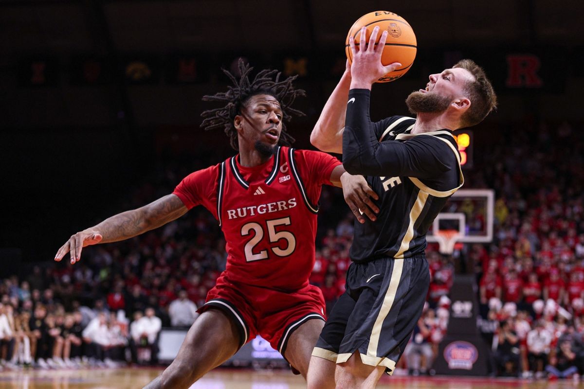 Jan 9, 2025; Piscataway, New Jersey, USA; Purdue Boilermakers guard Braden Smith (3) is guarded by Rutgers Scarlet Knights guard Jeremiah Williams (25) during the first half at Jersey Mike's Arena. Mandatory Credit: Vincent Carchietta-Imagn Images
