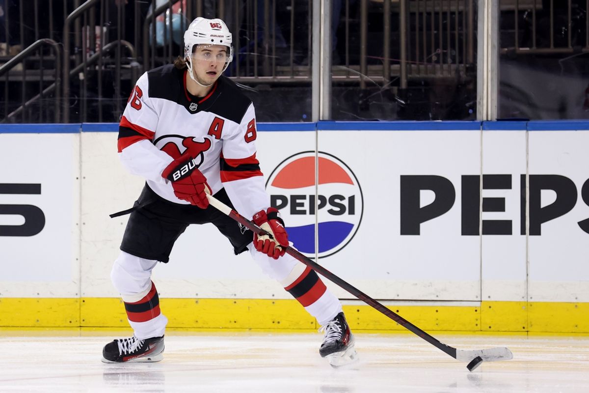 Jan 9, 2025; New York, New York, USA; New Jersey Devils center Jack Hughes (86) controls the puck against the New York Rangers during the first period at Madison Square Garden. Mandatory Credit: Brad Penner-Imagn Images