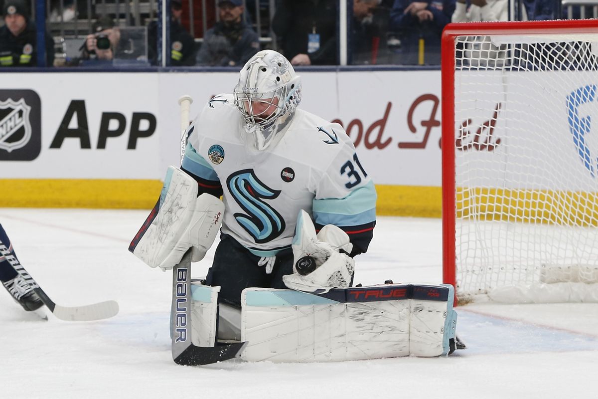 Jan 9, 2025; Columbus, Ohio, USA; Seattle Kraken goalie Philipp Grubauer (31) makes a glove save against the Columbus Blue Jackets during the second period at Nationwide Arena. Mandatory Credit: Russell LaBounty-Imagn Images