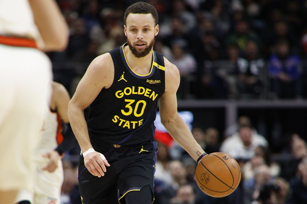 Jan 9, 2025; Detroit, Michigan, USA;  Golden State Warriors guard Stephen Curry (30) dribbles in the second half against the Detroit Pistons at Little Caesars Arena. Mandatory Credit: Rick Osentoski-Imagn Images