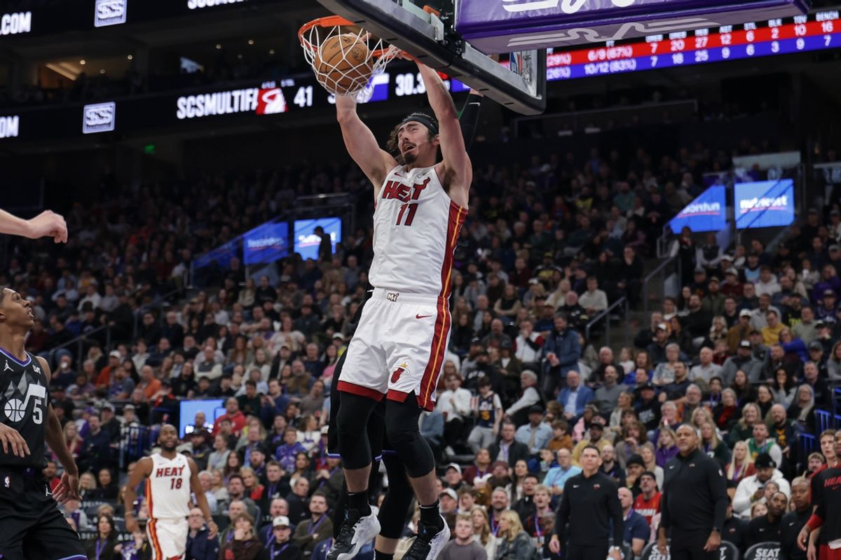 Jan 9, 2025; Salt Lake City, Utah, USA;  Miami Heat guard Jaime Jaquez Jr. (11) dunks the ball against the Utah Jazz during the second quarter at Delta Center. Mandatory Credit: Chris Nicoll-Imagn Images