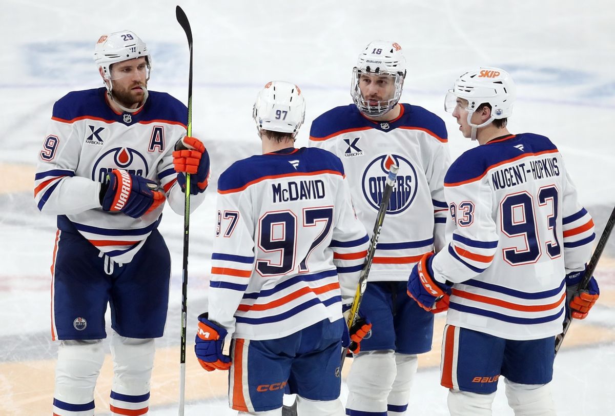 Jan 9, 2025; Pittsburgh, Pennsylvania, USA;  Edmonton Oilers center Leon Draisaitl (29) and Edmonton Oilers center Connor McDavid (97) and Edmonton Oilers left wing Zach Hyman (18) and Edmonton Oilers center Ryan Nugent-Hopkins (93) talk before a face-off against the Pittsburgh Penguins during the third period at PPG Paints Arena. Mandatory Credit: Charles LeClaire-Imagn Images