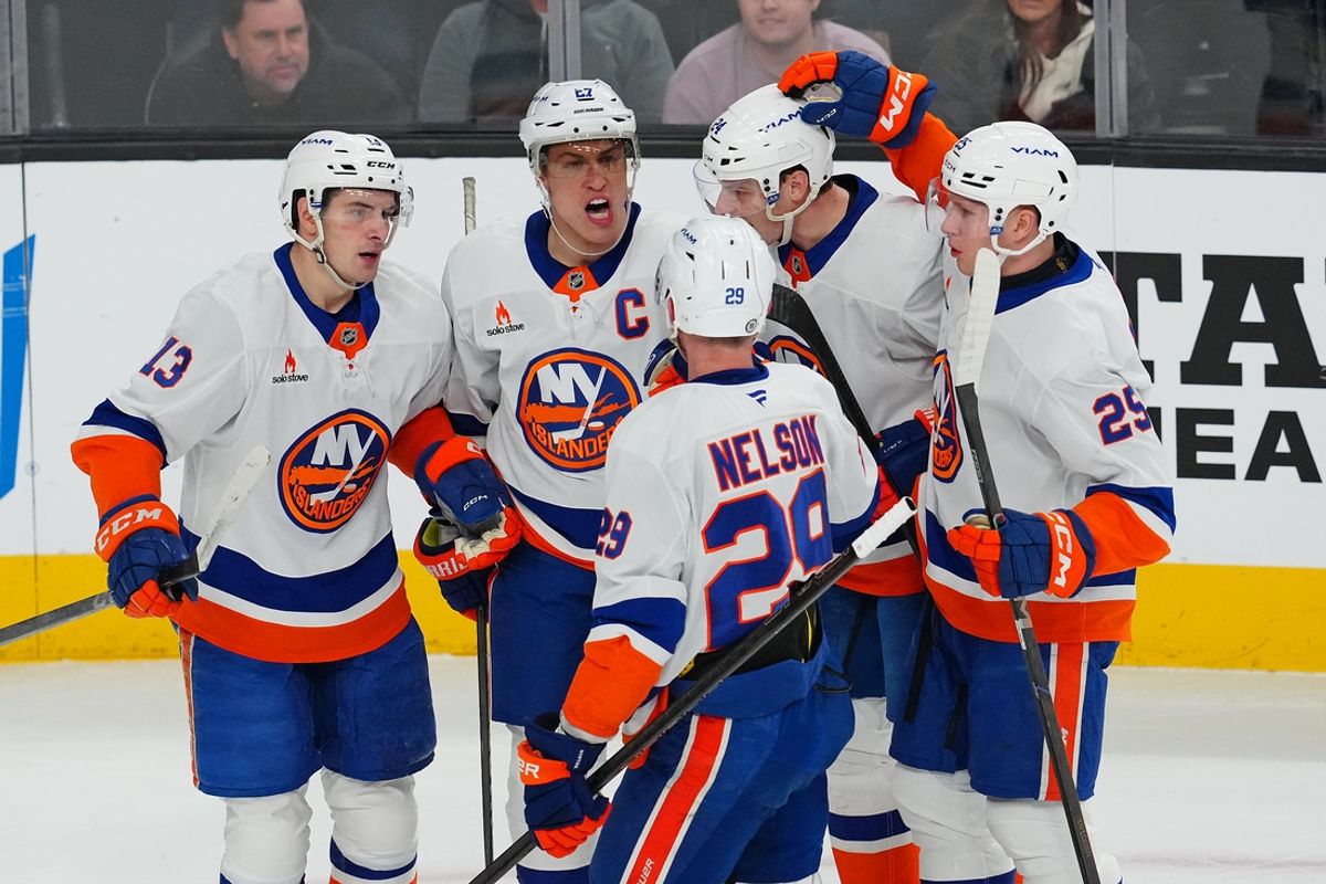 Jan 9, 2025; Las Vegas, Nevada, USA; New York Islanders left wing Anders Lee (27) celebrates with team mates after scoring a goal against the Vegas Golden Knights during the first period at T-Mobile Arena. Mandatory Credit: Stephen R. Sylvanie-Imagn Images