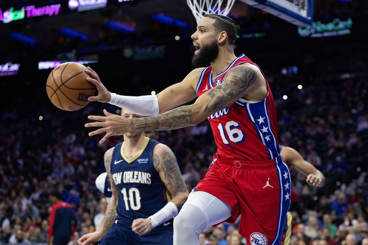 Jan 10, 2025; Philadelphia, Pennsylvania, USA; Philadelphia 76ers forward Caleb Martin (16) passes the ball against the New Orleans Pelicans during the second quarter at Wells Fargo Center. Mandatory Credit: Bill Streicher-Imagn Images