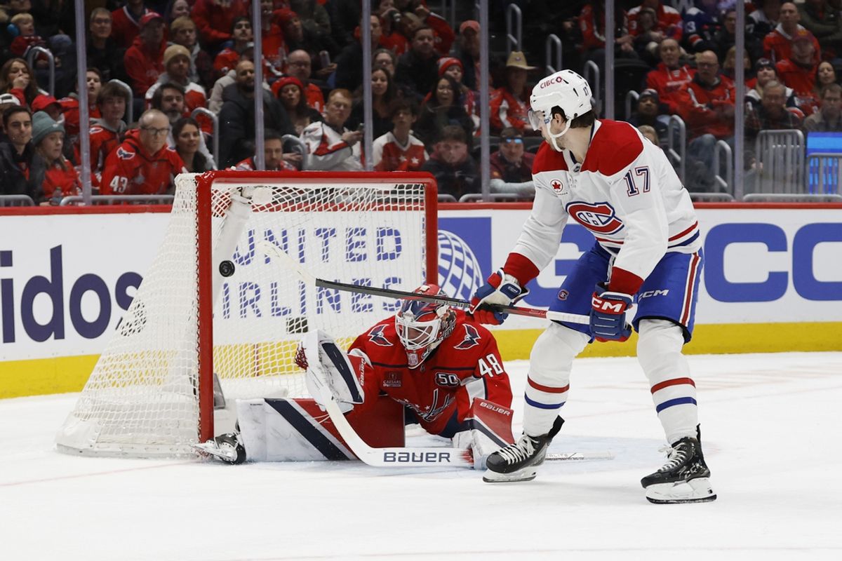 Jan 10, 2025; Washington, District of Columbia, USA; Montreal Canadiens right wing Josh Anderson (17) scores a goal on Washington Capitals goaltender Logan Thompson (48) in the second period at Capital One Arena. Mandatory Credit: Geoff Burke-Imagn Images