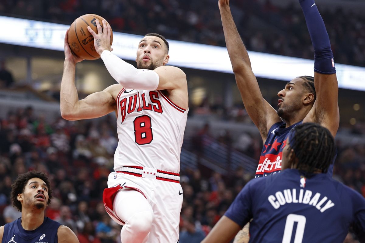 Jan 10, 2025; Chicago, Illinois, USA; Chicago Bulls guard Zach LaVine (8) drives to the basket against the Washington Wizards during the first half at United Center. Mandatory Credit: Kamil Krzaczynski-Imagn Images