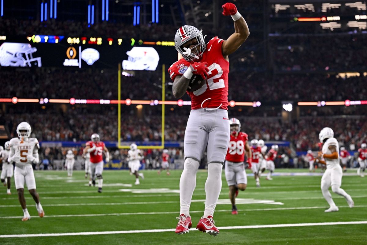 Jan 10, 2025; Arlington, TX, USA;  Ohio State Buckeyes running back TreVeyon Henderson (32) scores a touchdown on a pass from quarterback Will Howard (not pictured) during the second quarter at AT&T Stadium. Mandatory Credit: Jerome Miron-Imagn Images
