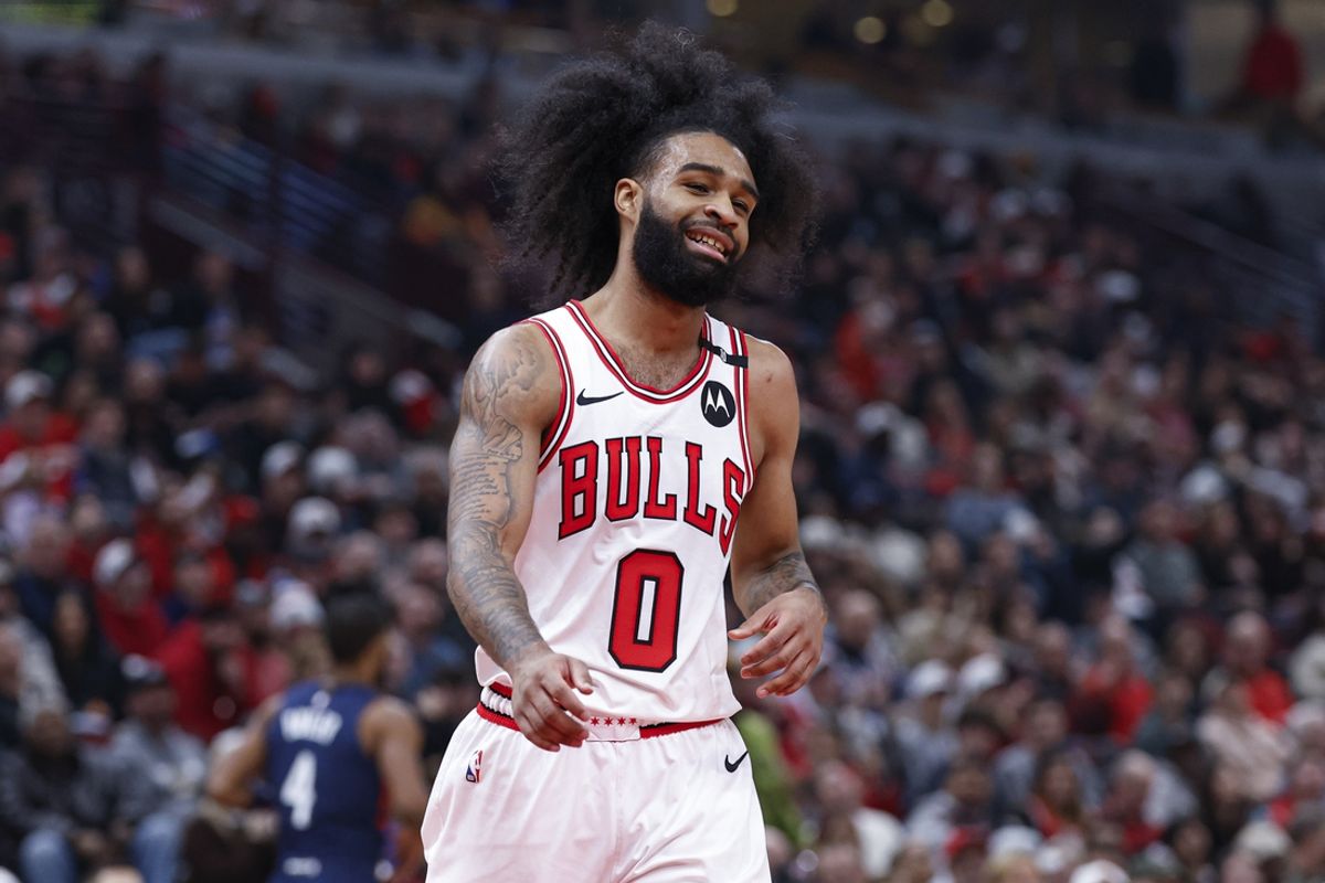 Jan 10, 2025; Chicago, Illinois, USA; Chicago Bulls guard Coby White (0) smiles after scoring against the Washington Wizards during the second half at United Center. Mandatory Credit: Kamil Krzaczynski-Imagn Images