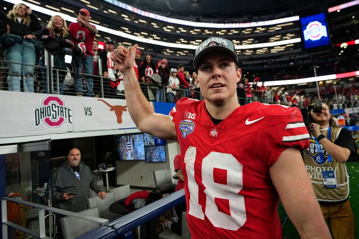 Ohio State Buckeyes quarterback Will Howard (18) leaves the field following the Cotton Bowl Classic College Football Playoff semifinal game against the Texas Longhorns at AT&T Stadium in Arlington, Texas on Jan. 10, 2025. Ohio State won 28-14.