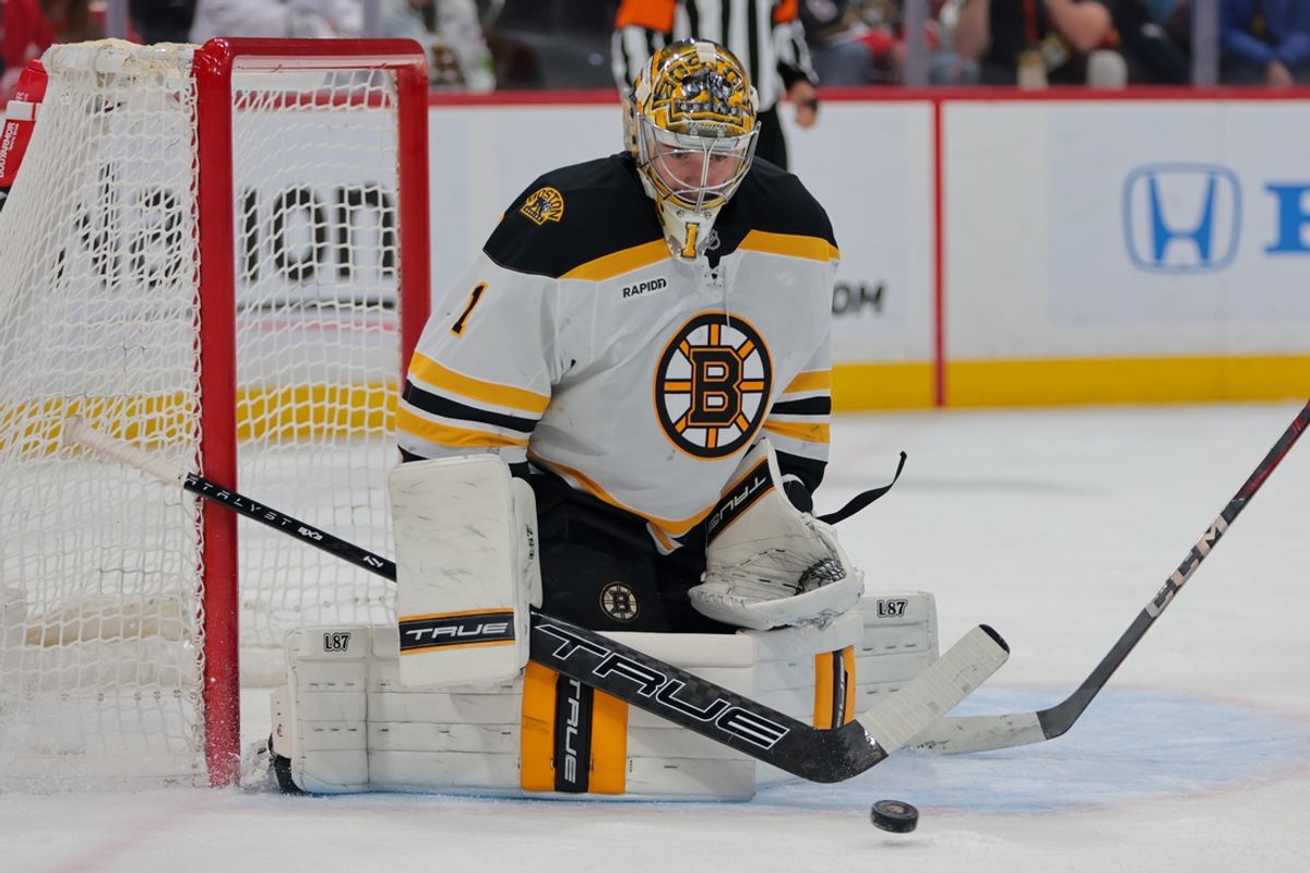 Jan 11, 2025; Sunrise, Florida, USA; Boston Bruins goaltender Jeremy Swayman (1) makes a save against the Florida Panthers during the second period at Amerant Bank Arena. Mandatory Credit: Sam Navarro-Imagn Images