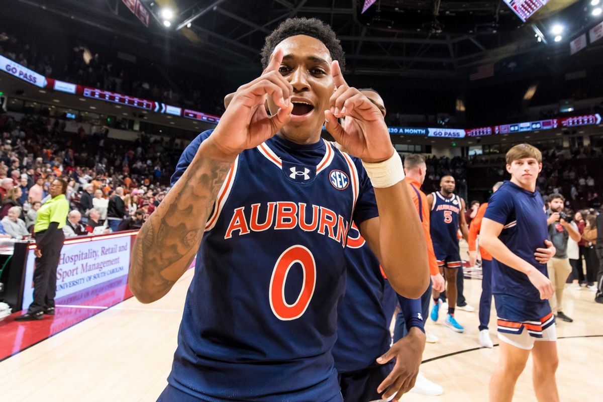 Jan 11, 2025; Columbia, South Carolina, USA;  Auburn Tigers guard Tahaad Pettiford (0) celebrates after defeating the South Carolina Gamecocks at Colonial Life Arena. Mandatory Credit: Jeff Blake-Imagn Images