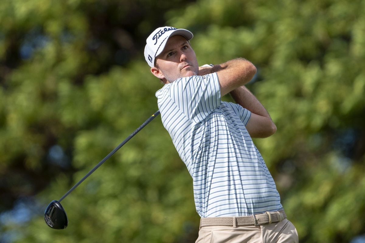 January 11, 2025; Honolulu, Hawaii, USA; Russell Henley hits his tee shot on the second hole during the third round of the Sony Open golf tournament at Waialae Country Club. Mandatory Credit: Kyle Terada-Imagn Images
