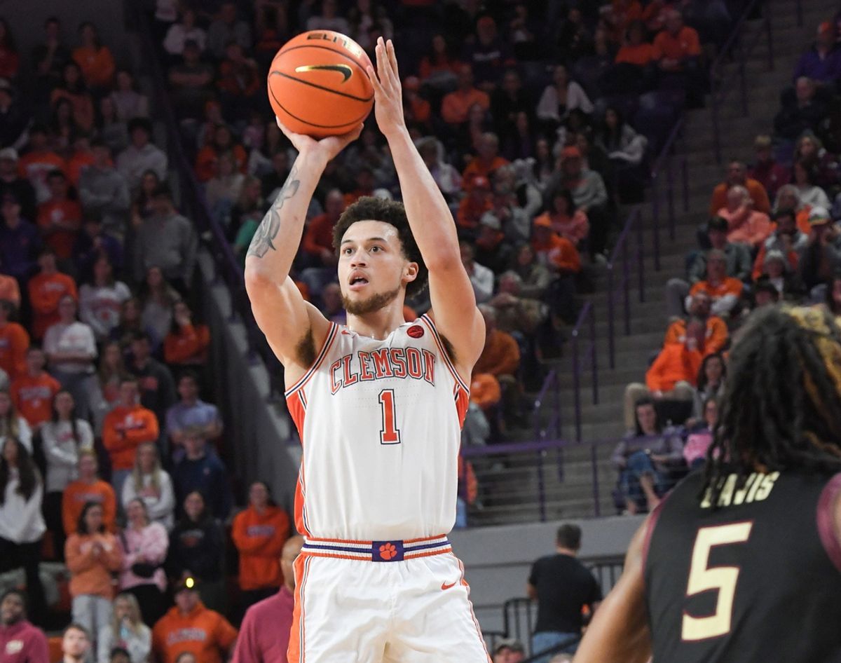 Clemson guard Chase Hunter (1) shoots near Florida State University guard Daquan Davis (5) during the second half at Littlejohn Coliseum in Clemson, S.C Saturday, January 11, 2025.