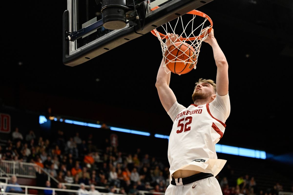 Jan 11, 2025; Stanford, California, USA; Stanford Cardinal forward Aidan Cammann (52) dunks against the Virginia Cavaliers in the second half at Maples Pavilion. Mandatory Credit: Eakin Howard-Imagn Images