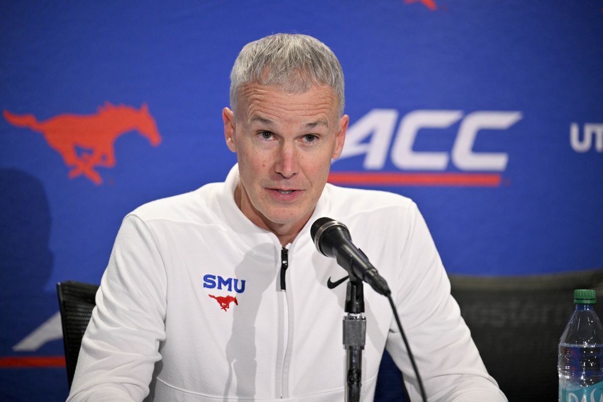 Jan 11, 2025; Dallas, Texas, USA; SMU Mustangs head coach Andy Enfield speaks with the media after the game against the Georgia Tech Yellow Jackets during the second half at Moody Coliseum. Mandatory Credit: Jerome Miron-Imagn Images