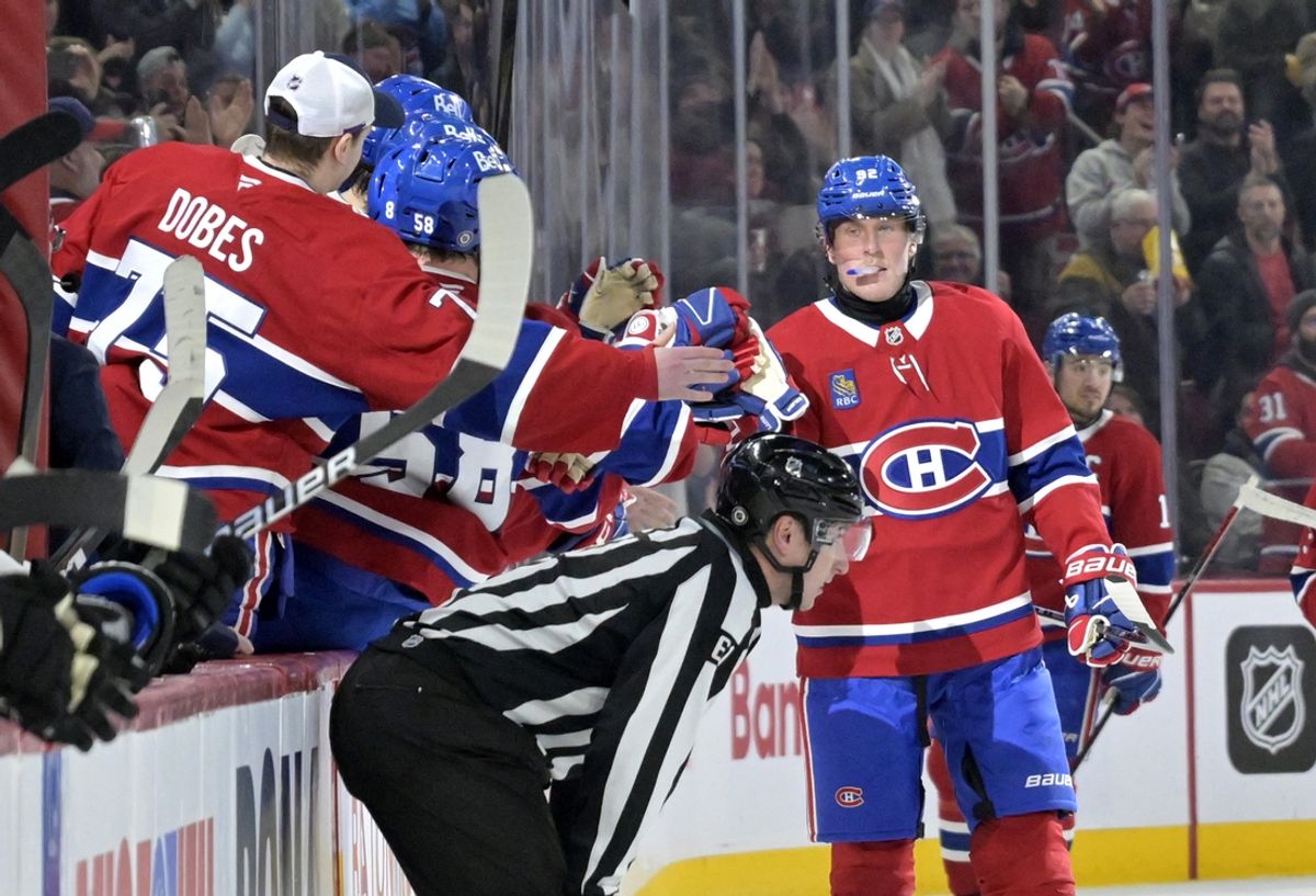 Jan 11, 2025; Montreal, Quebec, CAN; Montreal Canadiens forward Patrik Laine (92) celebrates with teammates after scoring a goal against the Dallas Stars during the second period at the Bell Centre. Mandatory Credit: Eric Bolte-Imagn Images