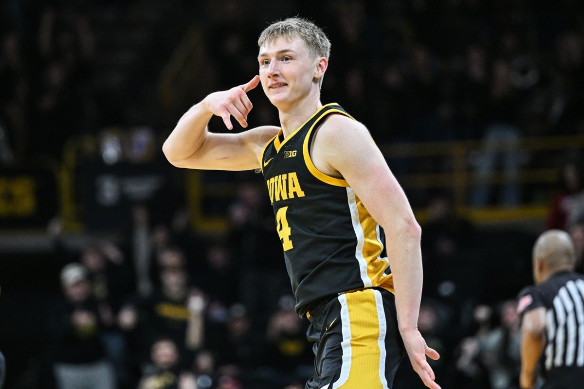Jan 11, 2025; Iowa City, Iowa, USA; Iowa Hawkeyes guard Josh Dix (4) reacts during the second half against the Indiana Hoosiers at Carver-Hawkeye Arena. Mandatory Credit: Jeffrey Becker-Imagn Images