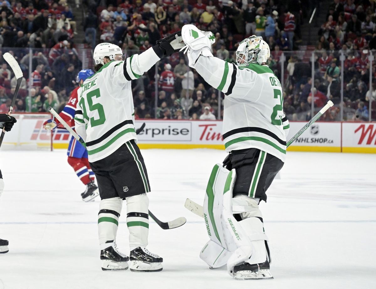 Jan 11, 2025; Montreal, Quebec, CAN; Dallas Stars goalie Jake Oettinger (29) and forward Matt Duchene (95) celebrates after defeating the Montreal Canadiens in a shootout at the Bell Centre. Mandatory Credit: Eric Bolte-Imagn Images