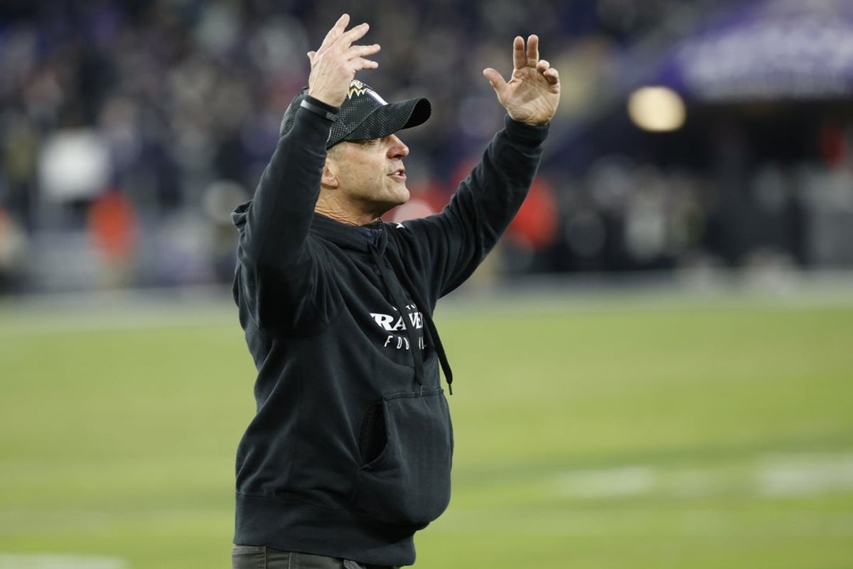 Jan 11, 2025; Baltimore, Maryland, USA; Baltimore Ravens head coach John Harbaugh gestures to the crowd in the final minute against the Pittsburgh Steelers during the fourth quarter in an AFC wild card game at M&T Bank Stadium. Mandatory Credit: Geoff Burke-Imagn Images