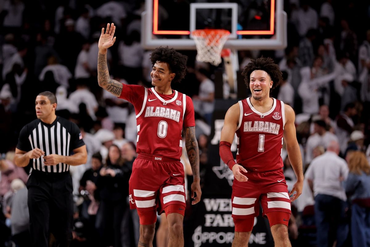 Jan 11, 2025; College Station, Texas, USA; Alabama Crimson Tide guards Labaron Philon (0) and Mark Sears (1) react after the final buzzer against the Texas A&M Aggies  at Reed Arena. Mandatory Credit: Erik Williams-Imagn Images
