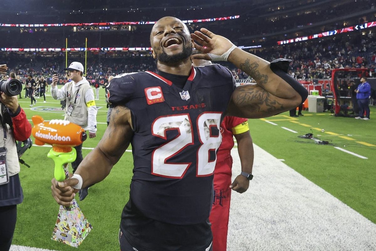Jan 11, 2025; Houston, Texas, USA; Houston Texans running back Joe Mixon (28) reacts after the game against the Los Angeles Chargers in an AFC wild card game at NRG Stadium. Mandatory Credit: Troy Taormina-Imagn Images