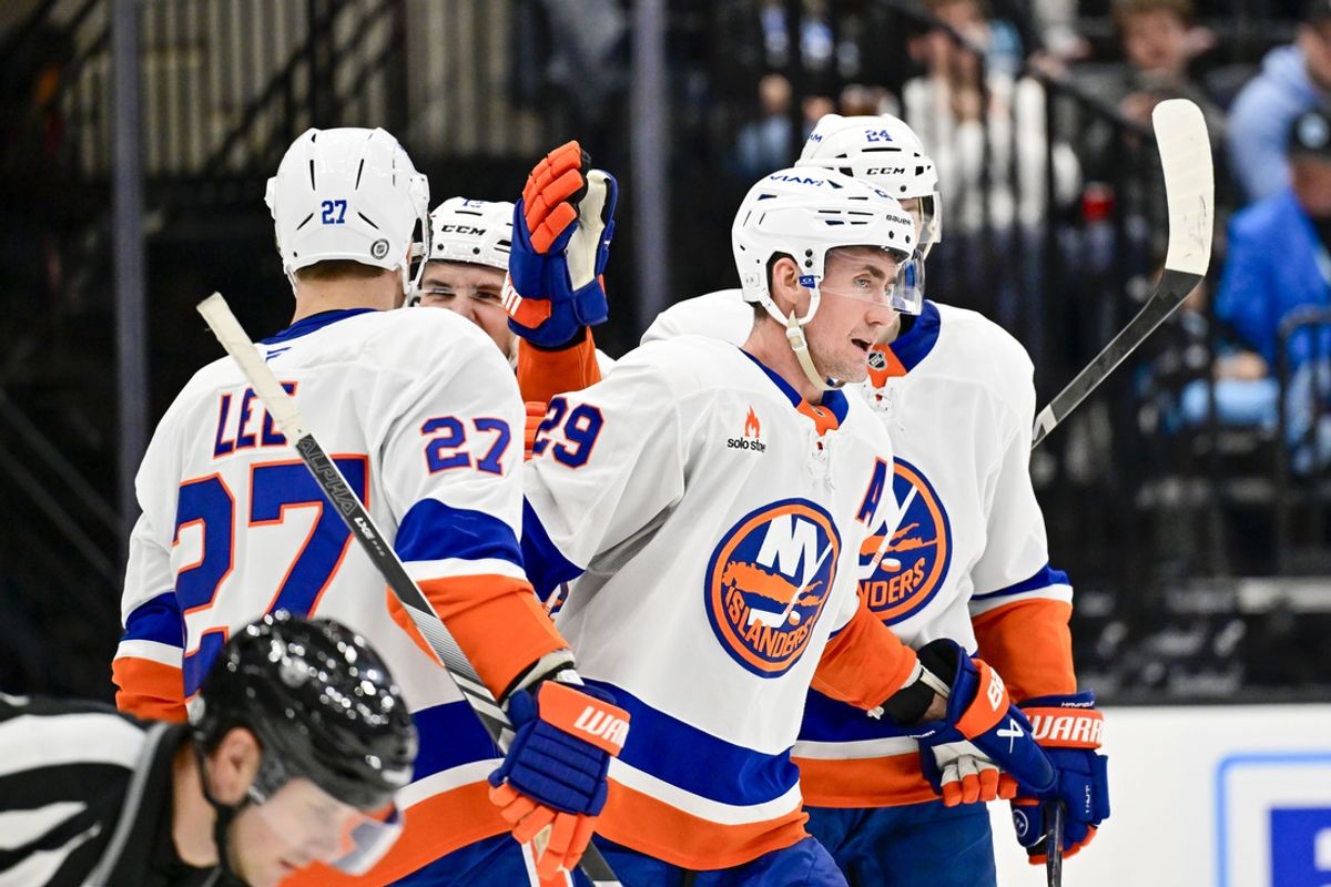 Jan 11, 2025; Salt Lake City, Utah, USA; New York Islanders center Brock Nelson (29) celebrates with left wing Anders Lee (27), defenseman Scott Mayfield (24), and center Mathew Barzal (13) after a goal against the Utah Hockey Club during third period at the Delta Center. Mandatory Credit: Christopher Creveling-Imagn Images