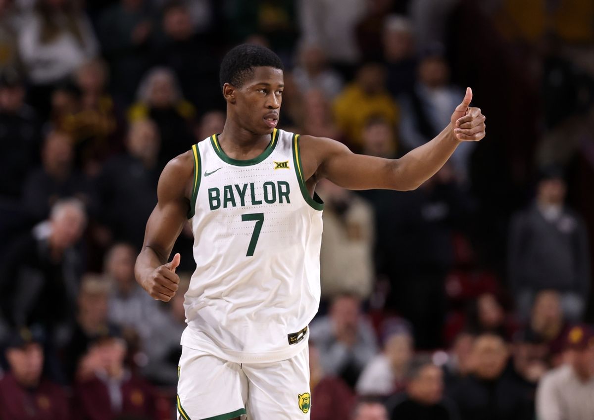 Jan 11, 2025; Tempe, Arizona, USA; Baylor Bears guard VJ Edgecombe (7) against the Arizona State Sun Devils in overtime at Desert Financial Arena. Mandatory Credit: Mark J. Rebilas-Imagn Images