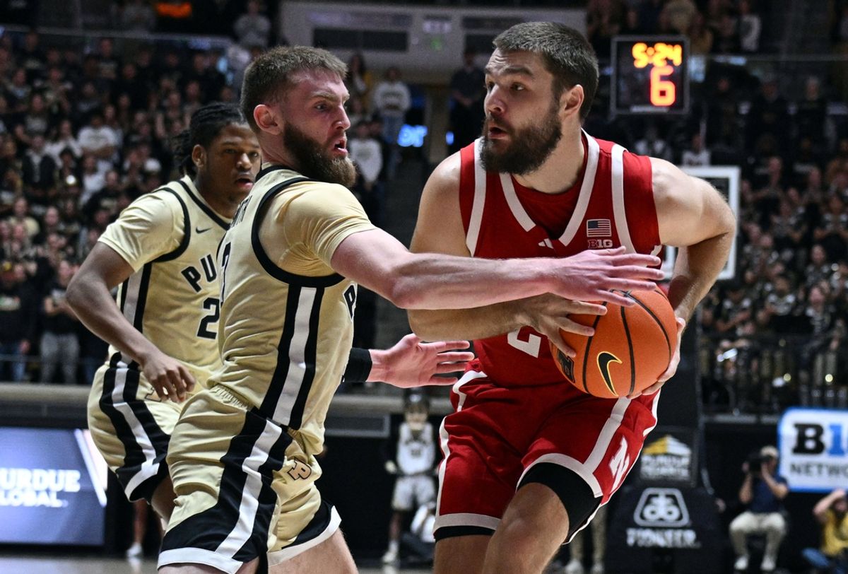 Jan 12, 2025; West Lafayette, Indiana, USA;  Purdue Boilermakers guard Braden Smith (3) gets a hand on a ball controlled by Nebraska Cornhuskers guard Rollie Worster (24) during the first half at Mackey Arena. Mandatory Credit: Marc Lebryk-Imagn Images