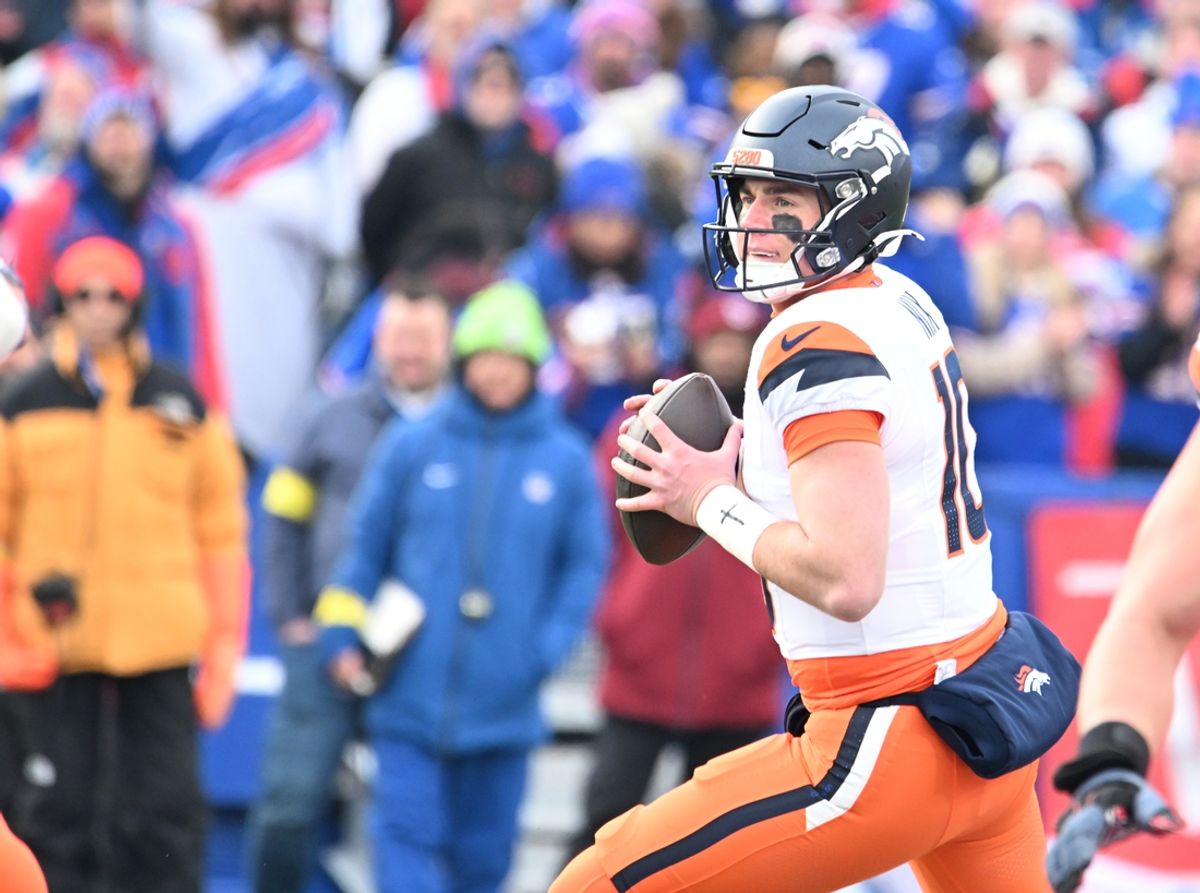 Jan 12, 2025; Orchard Park, New York, USA; Denver Broncos quarterback Bo Nix (10) moves in the pocket during the first quarter against the Buffalo Bills in an AFC wild card game at Highmark Stadium. Mandatory Credit: Mark Konezny-Imagn Images