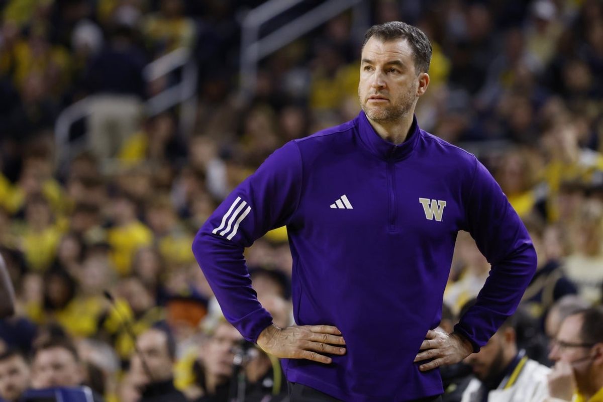 Jan 12, 2025; Ann Arbor, Michigan, USA; Washington Huskies head coach Danny Sprinkle looks on in the first half against the Michigan Wolverines at Crisler Center. Mandatory Credit: Rick Osentoski-Imagn Images