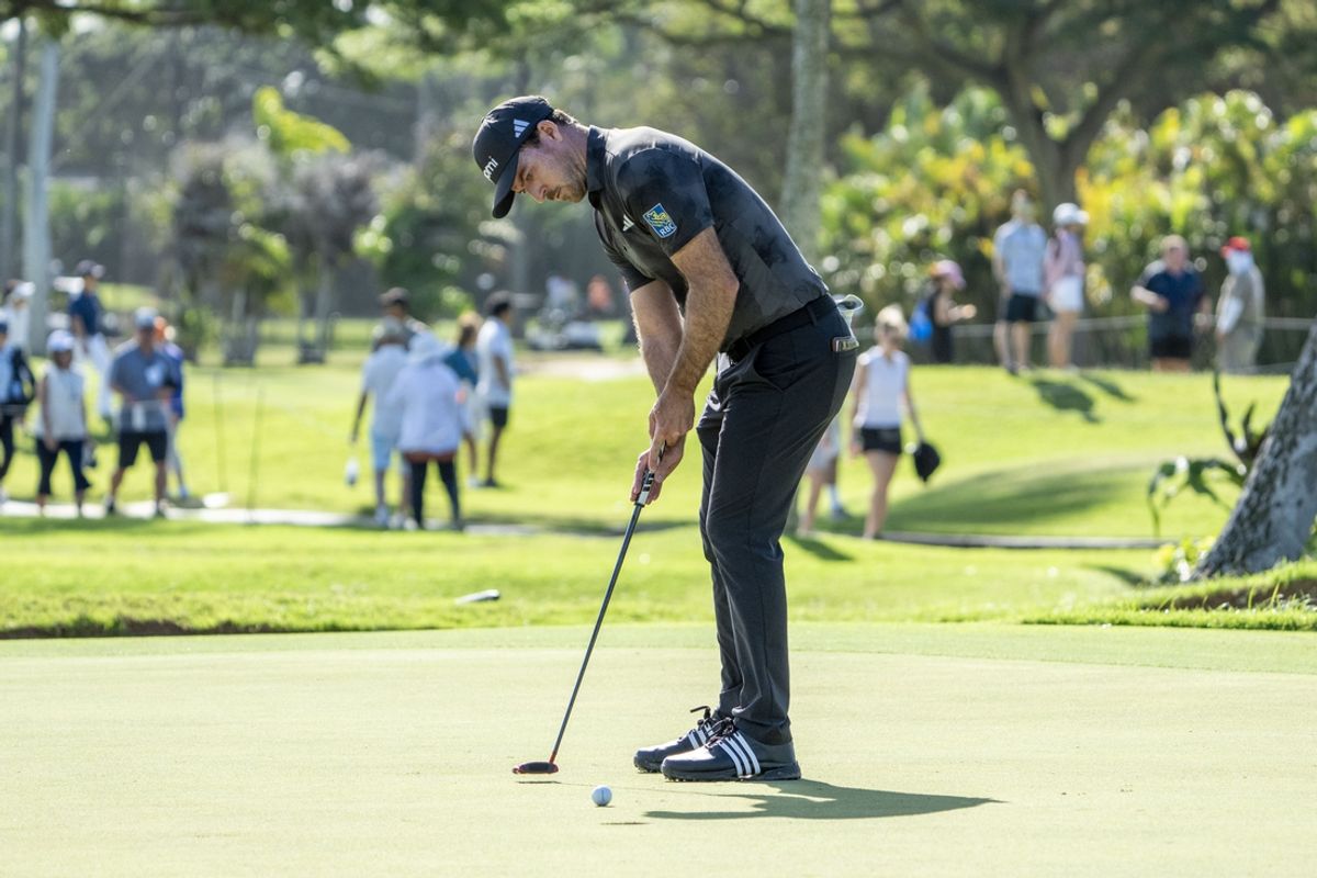 January 12, 2025; Honolulu, Hawaii, USA; Nick Taylor putts on the third hole during the final round of the Sony Open golf tournament at Waialae Country Club. Mandatory Credit: Kyle Terada-Imagn Images