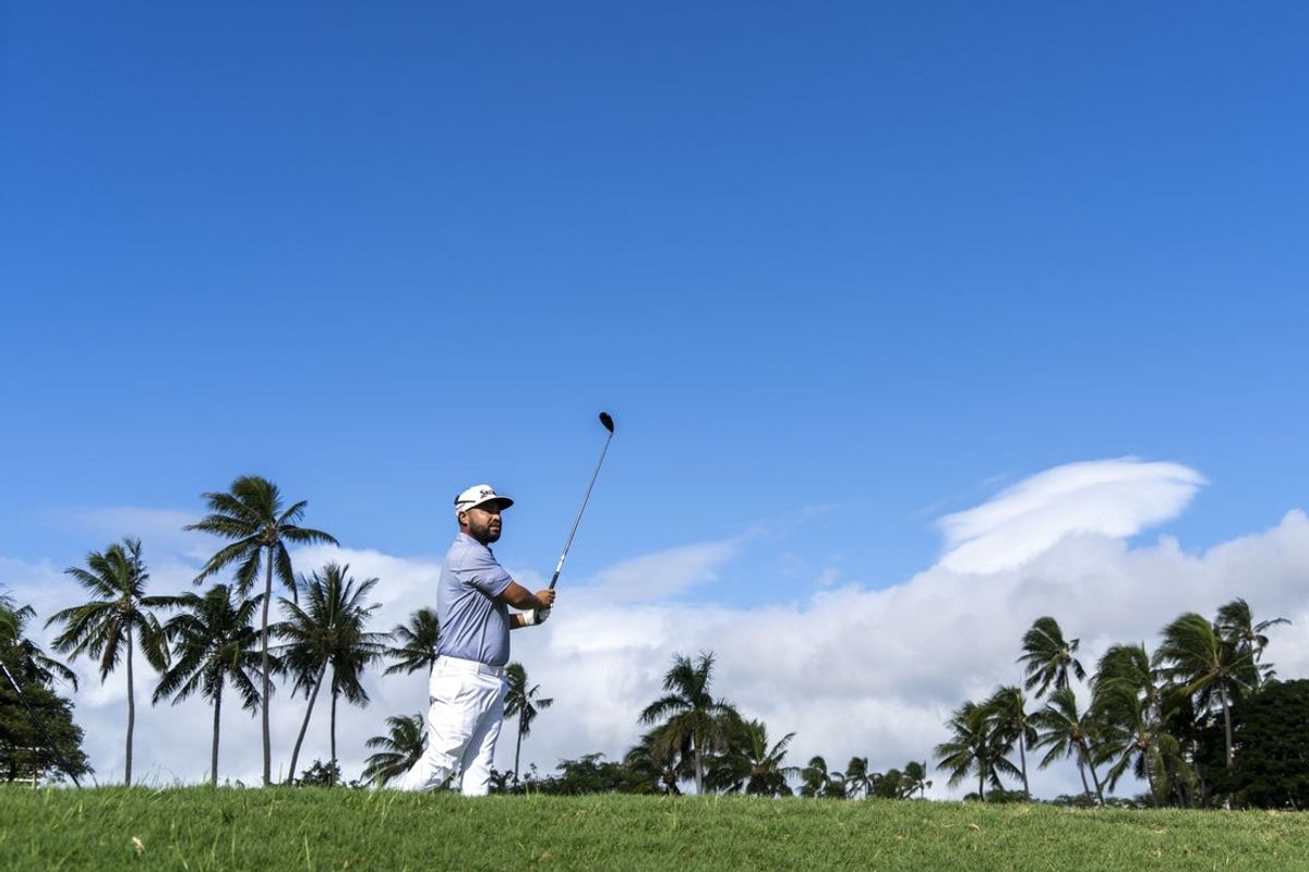 January 12, 2025; Honolulu, Hawaii, USA; J.J. Spaun hits his tee shot on the second hole during the final round of the Sony Open golf tournament at Waialae Country Club. Mandatory Credit: Kyle Terada-Imagn Images