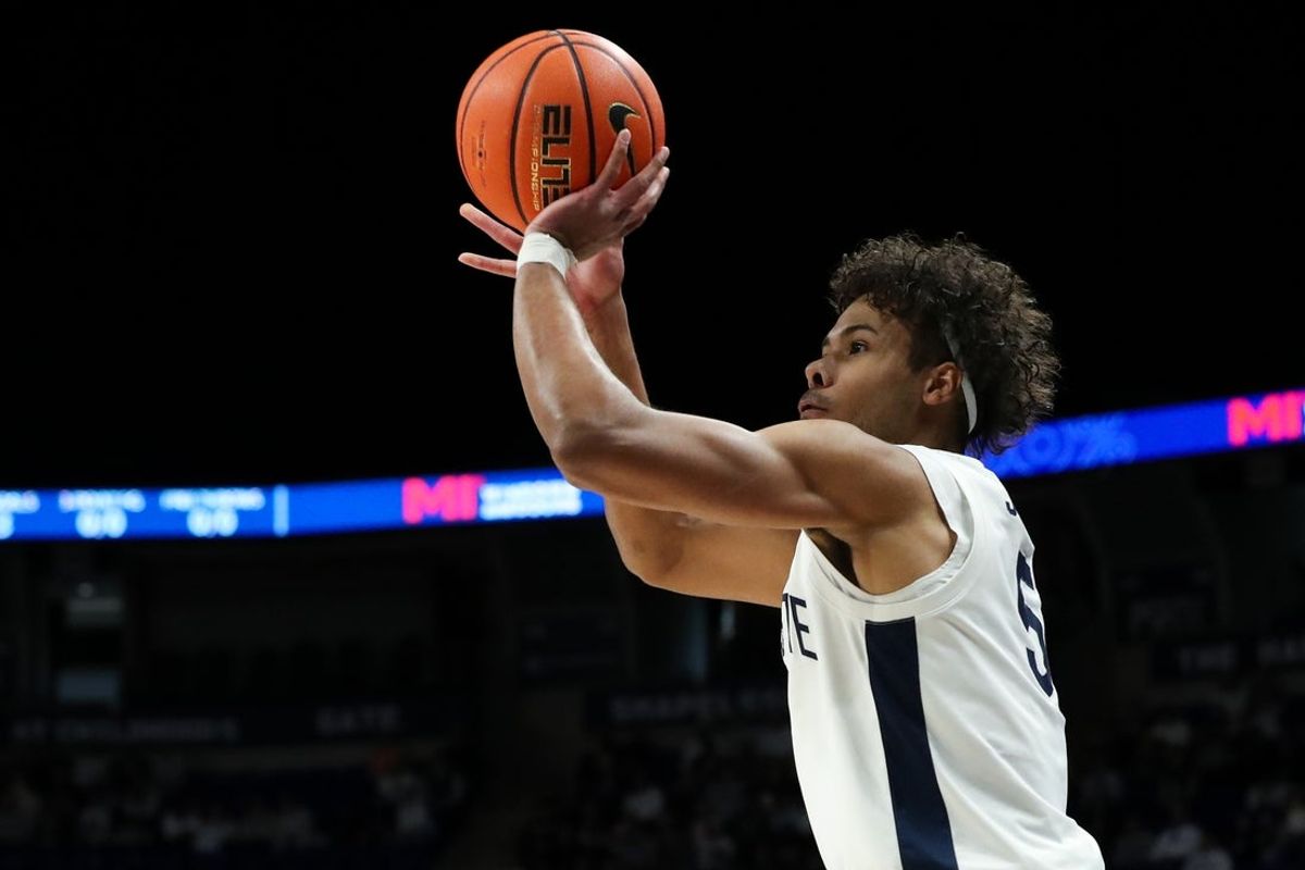 Jan 12, 2025; University Park, Pennsylvania, USA; Penn State Nittany Lions guard/forward Puff Johnson (5) shoots the ball during the first half against the Oregon Ducks at Bryce Jordan Center. Mandatory Credit: Matthew O'Haren-Imagn Images